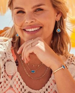 Elton Gold Cuff Bracelet In Teal Abalone 9 Elton Gold Cuff Bracelet In Teal Abalone -Kendra Scott Jewelry Store Kendra Scott Elton Cuff Bracelet Teal Abalone Gold 00