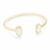Elton Gold Cuff Bracelet In White Kyocera Opal 1 Elton Gold Cuff Bracelet In White Kyocera Opal -Kendra Scott Jewelry Store kendra scott elton bracelet gold white opal 00 lg